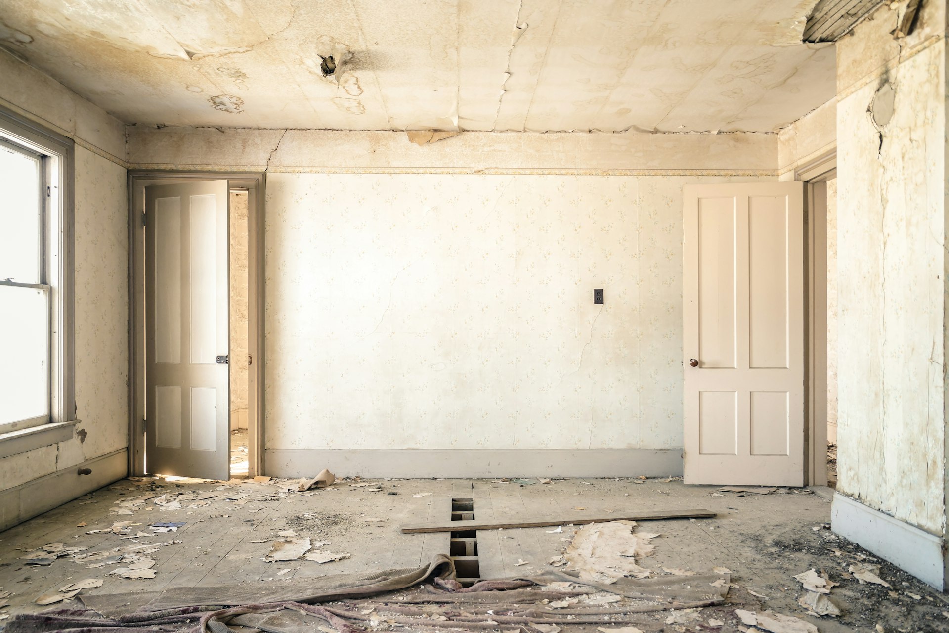 gray concrete walls with broken floor